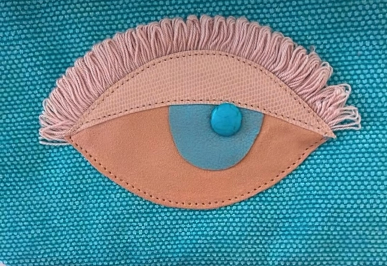 Nima Eye Zipper Clutch
